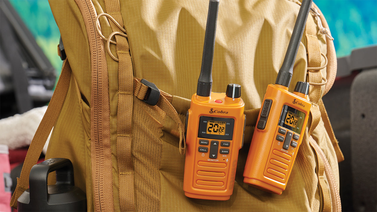 Cobra Traiblazer 250 GMRS Radio clipped to a backpack